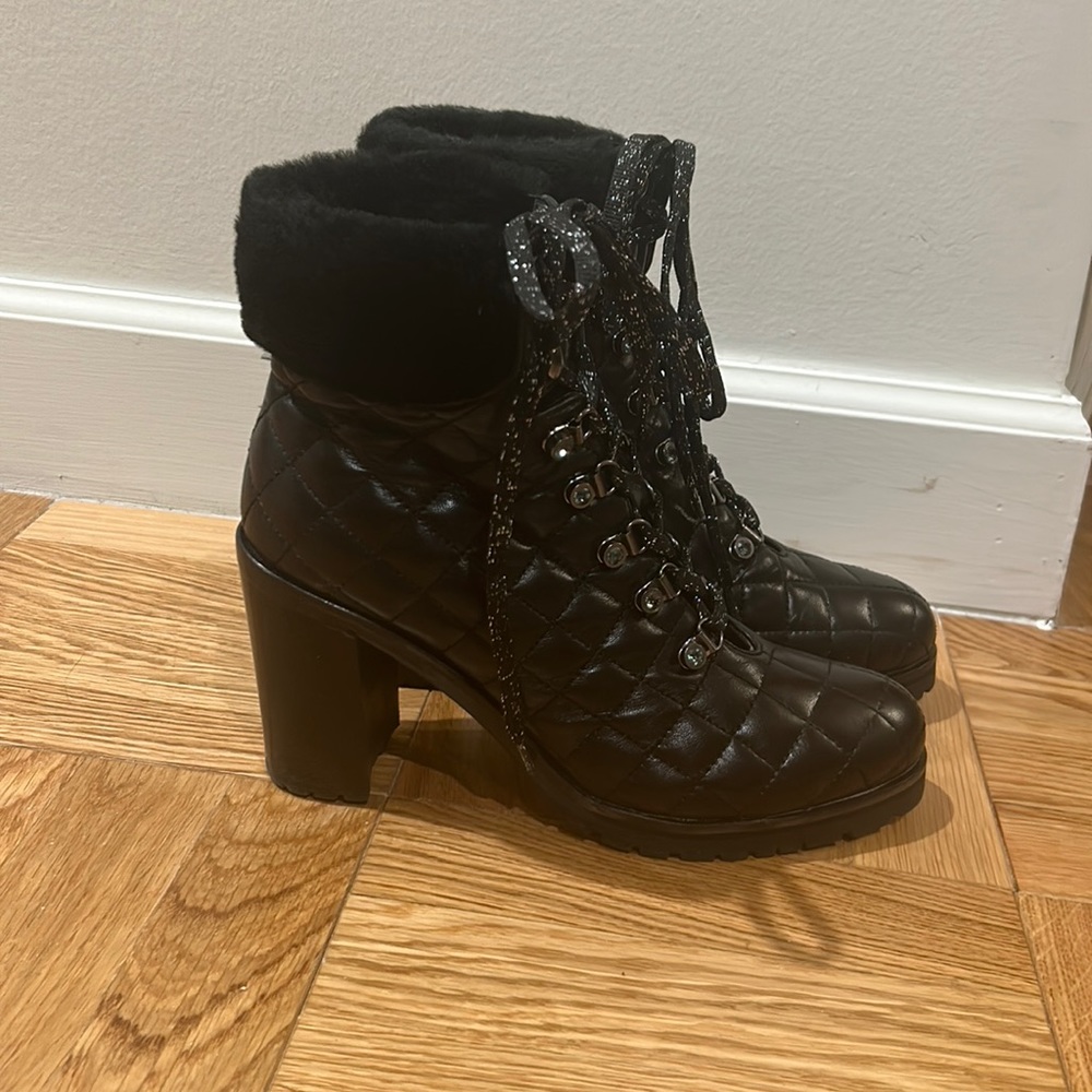 Pair of Quilted Black Leather high boots with fur trim. Worn twice.